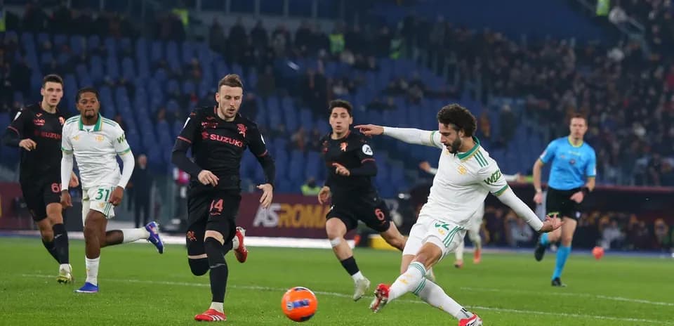 Player kicking the ball during Torino vs AS Roma match