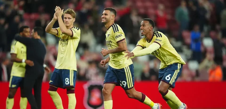 Players celebrating after scoring during a match