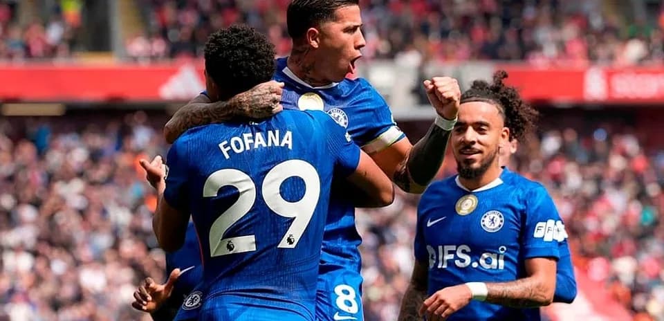 Chelsea players celebrating a goal against Liverpool