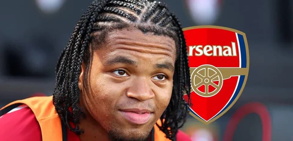 Player in Arsenal jersey with braided hair
