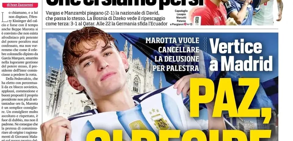 Football player wearing Argentina jersey with city background