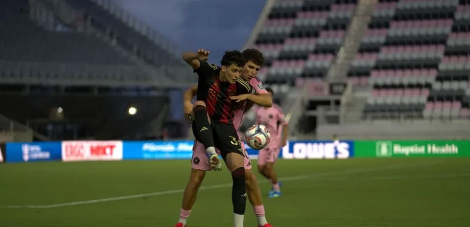 Player from Atlanta United II tackling Inter Miami II opponent