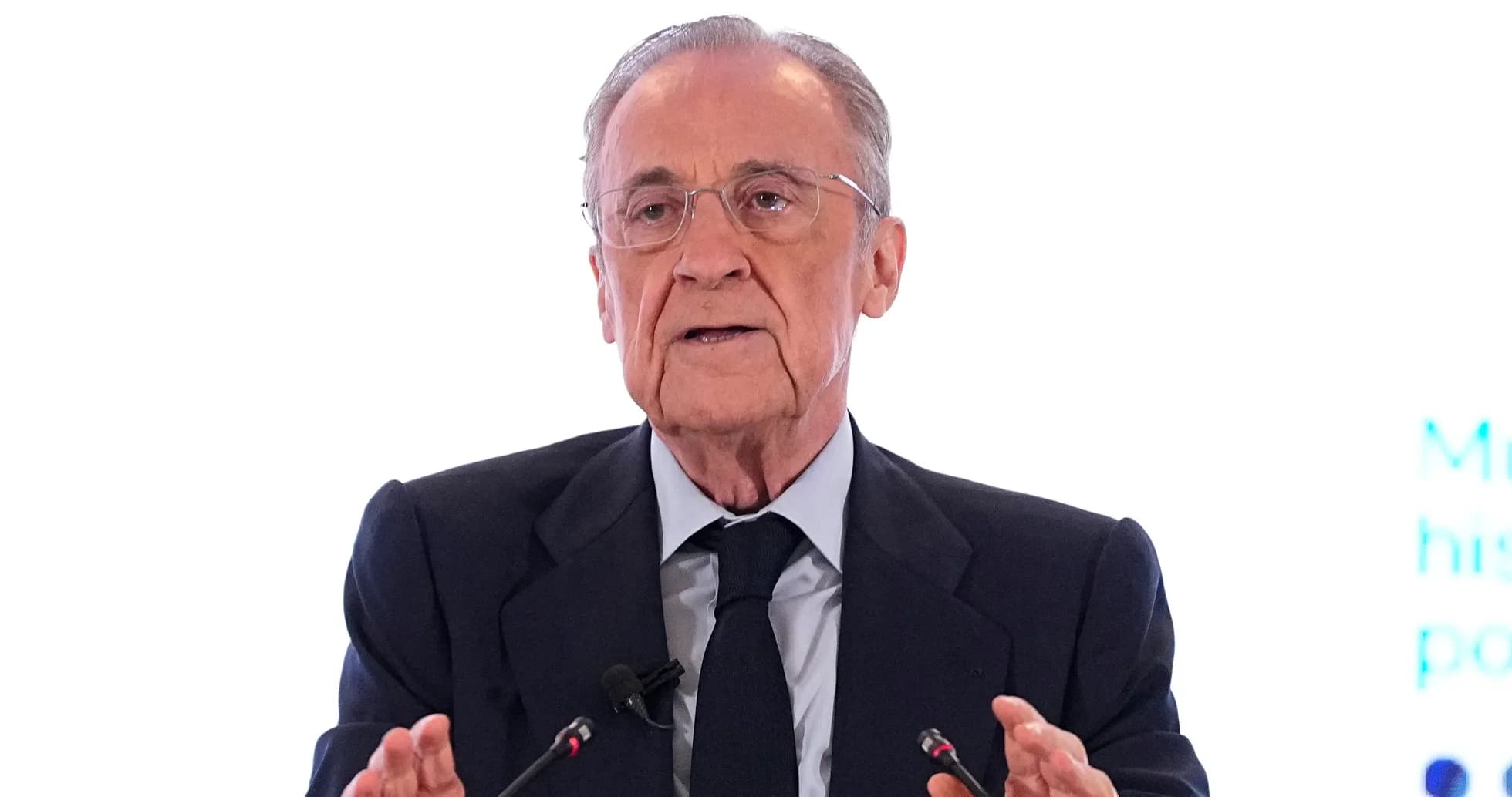 Man speaking at a podium during an event