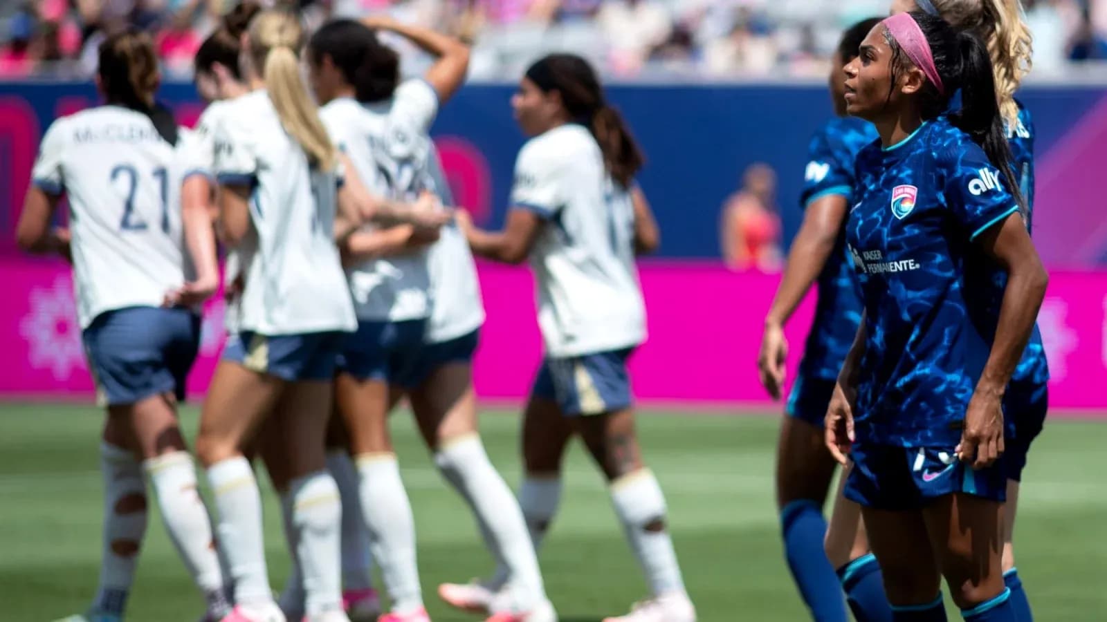 Seattle Reign FC players celebrating a goal
