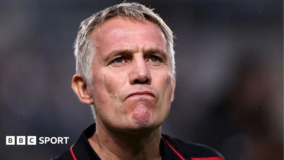Coach looking focused during a match