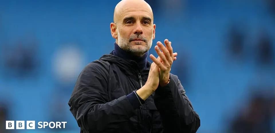 Manager applauding after match at stadium
