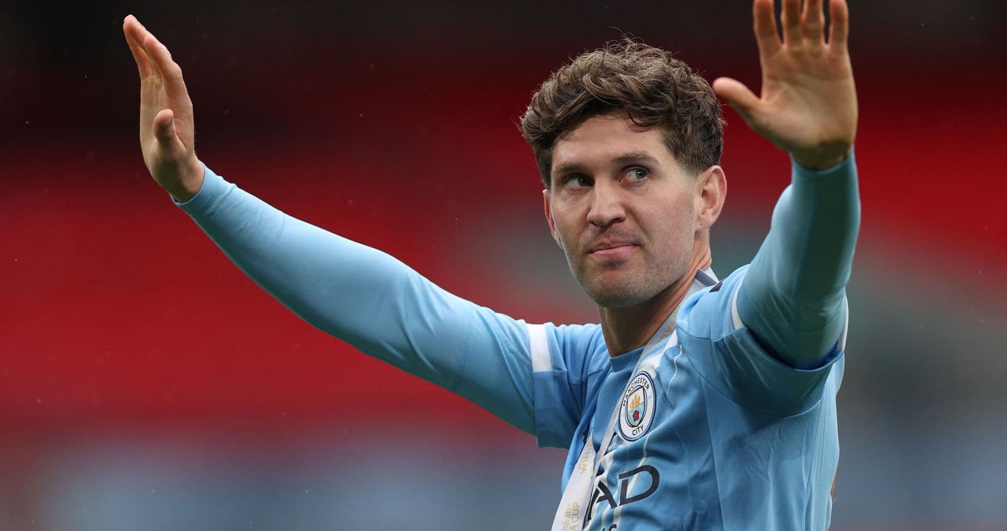 Player waving to fans during match