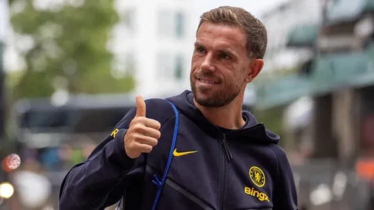 Player giving thumbs up outside the stadium