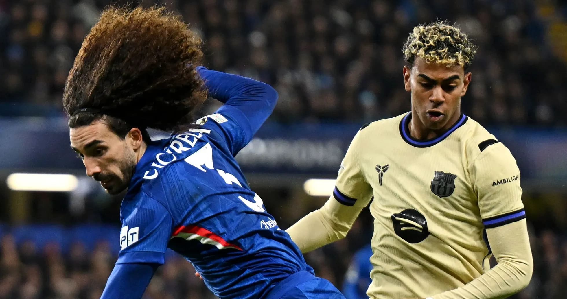 Two players in action during a football match