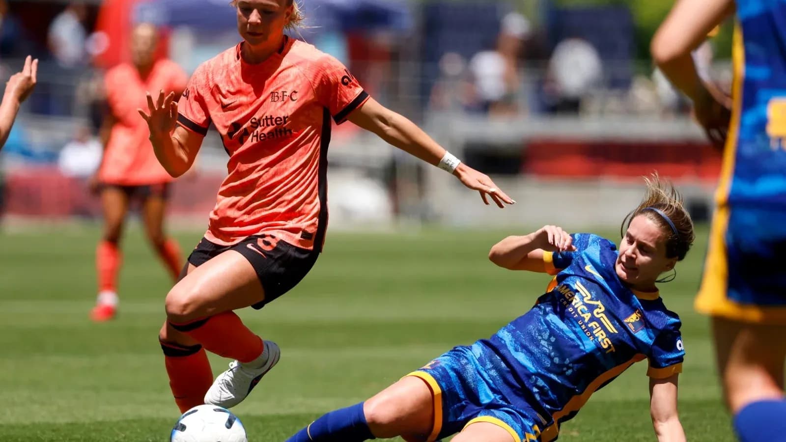 Bay FC player dribbling past Utah Royals defender