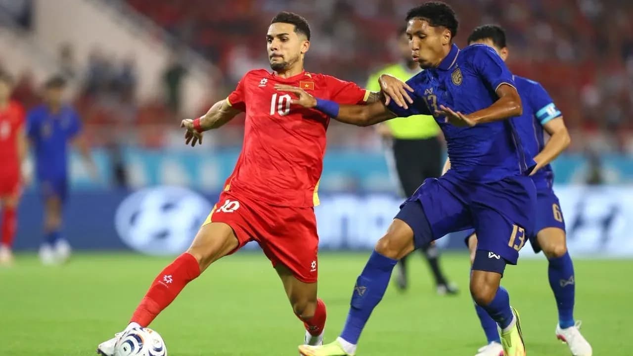 Players from opposing teams contesting for the ball