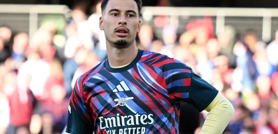 Goalkeeper wearing training kit during warm-up