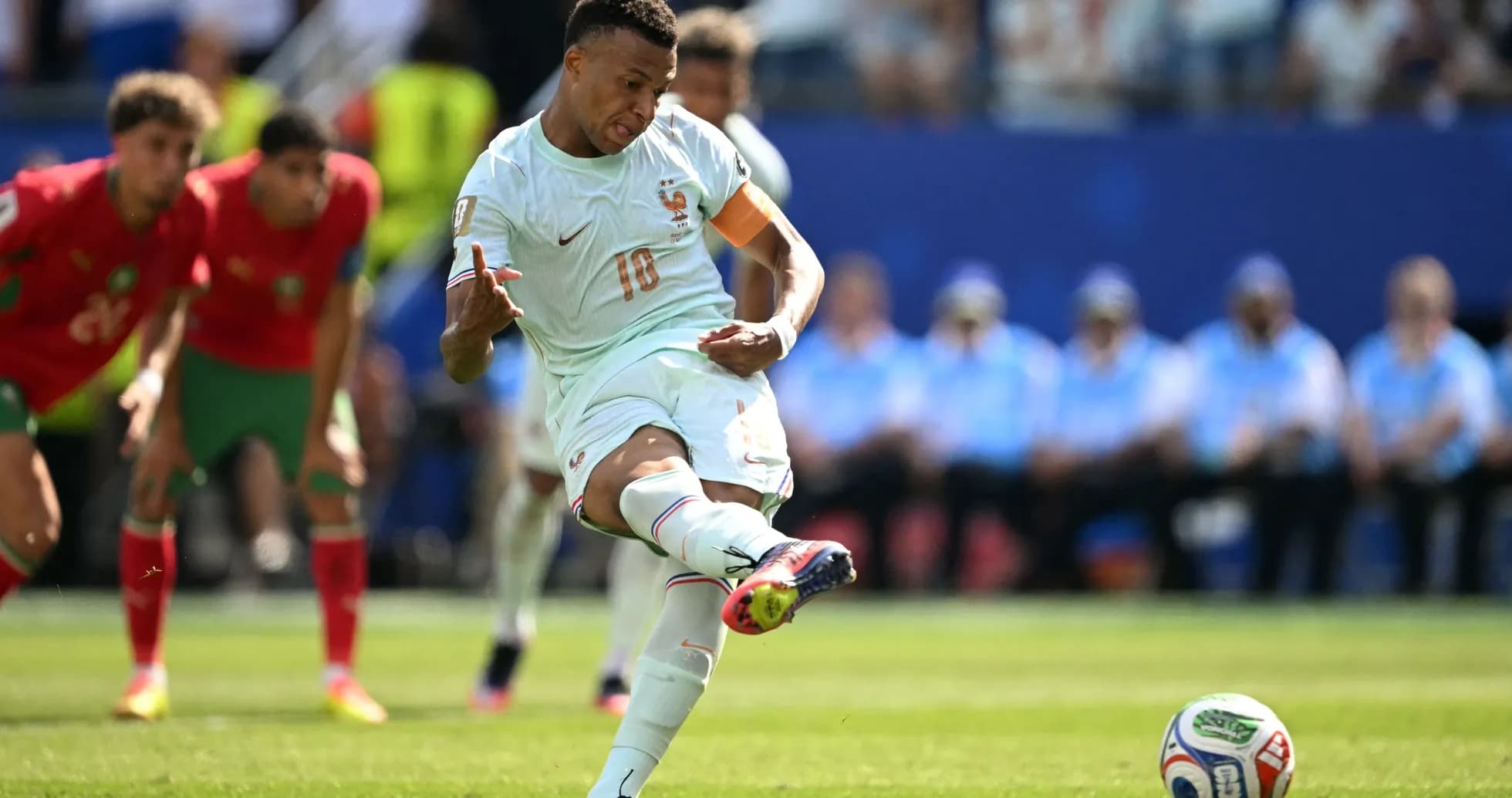 Player taking a penalty kick during match