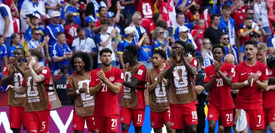 Canada national team applauding fans after match