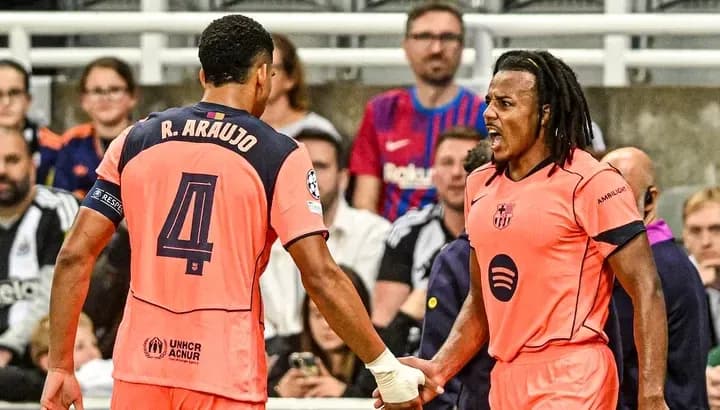 Two players discussing during a match celebration