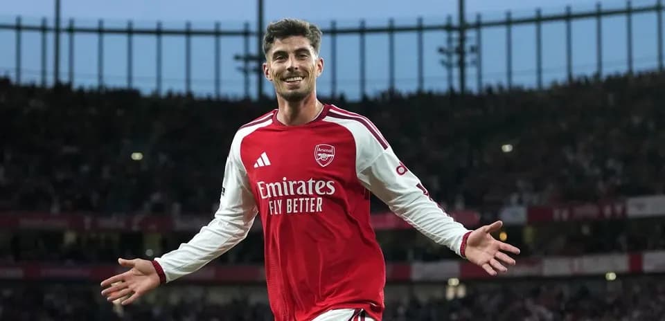 Player celebrating a goal on the pitch