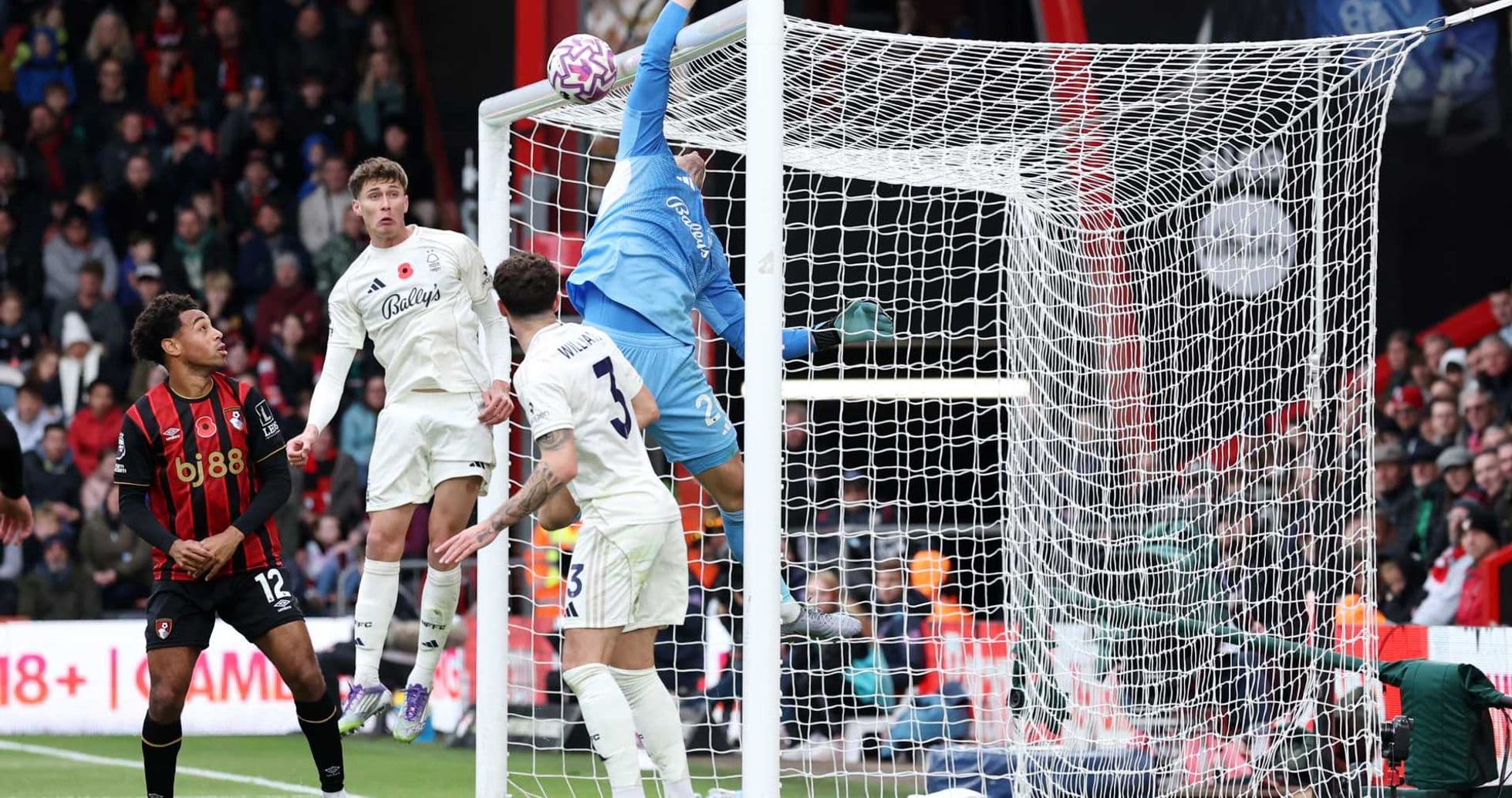 Goalkeeper making a save during Nottingham Forest match