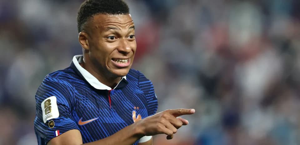 Kylian Mbappé celebrating during a match