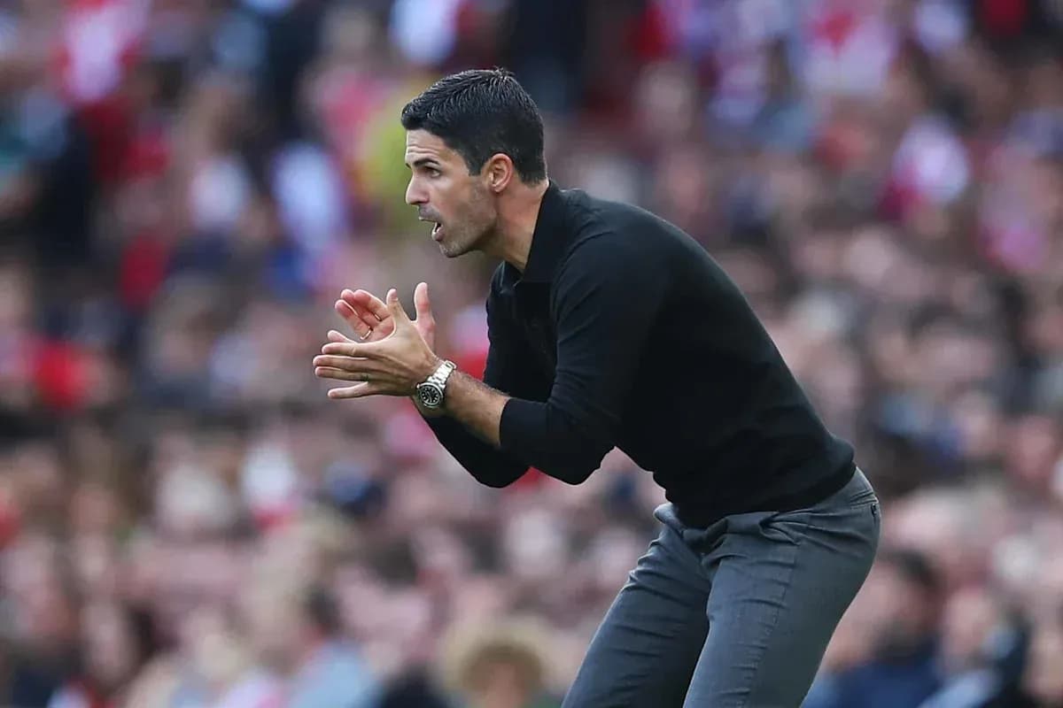 Coach gesturing during a match on the sidelines