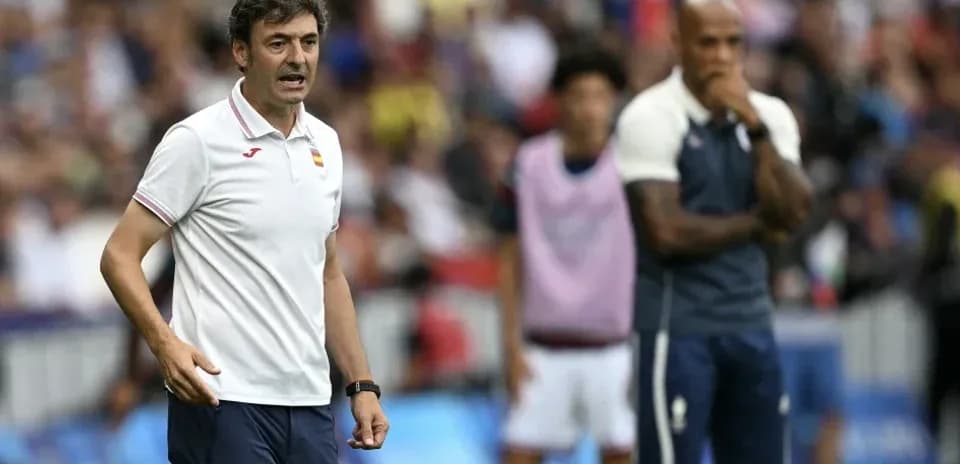 Coach giving instructions during a match on the sideline