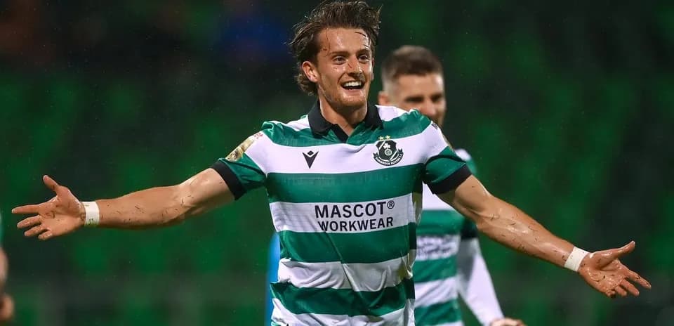 Player celebrating a goal in team uniform