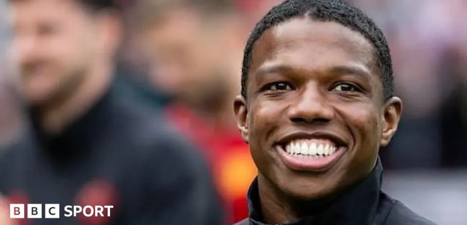 Player smiling during warm-up before match
