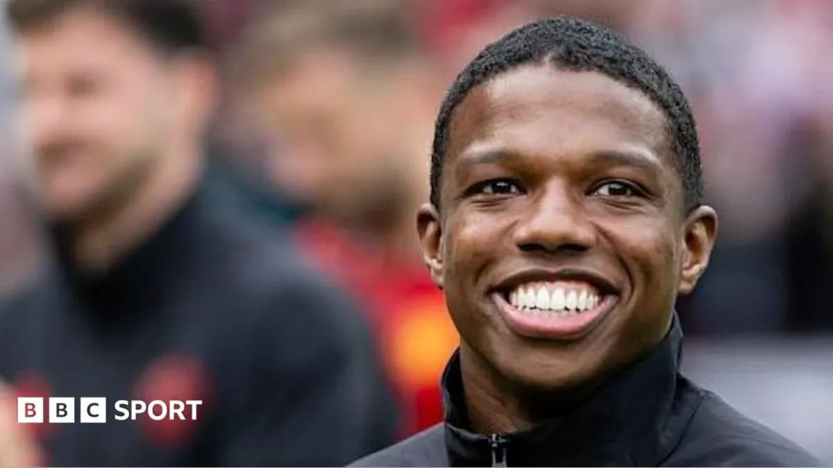 Player smiling during warm-up before match