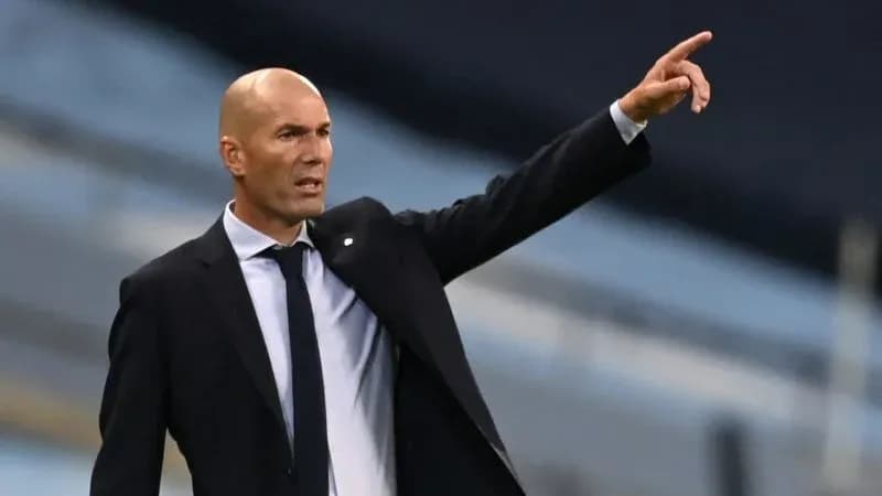 Manager giving tactical instructions during match