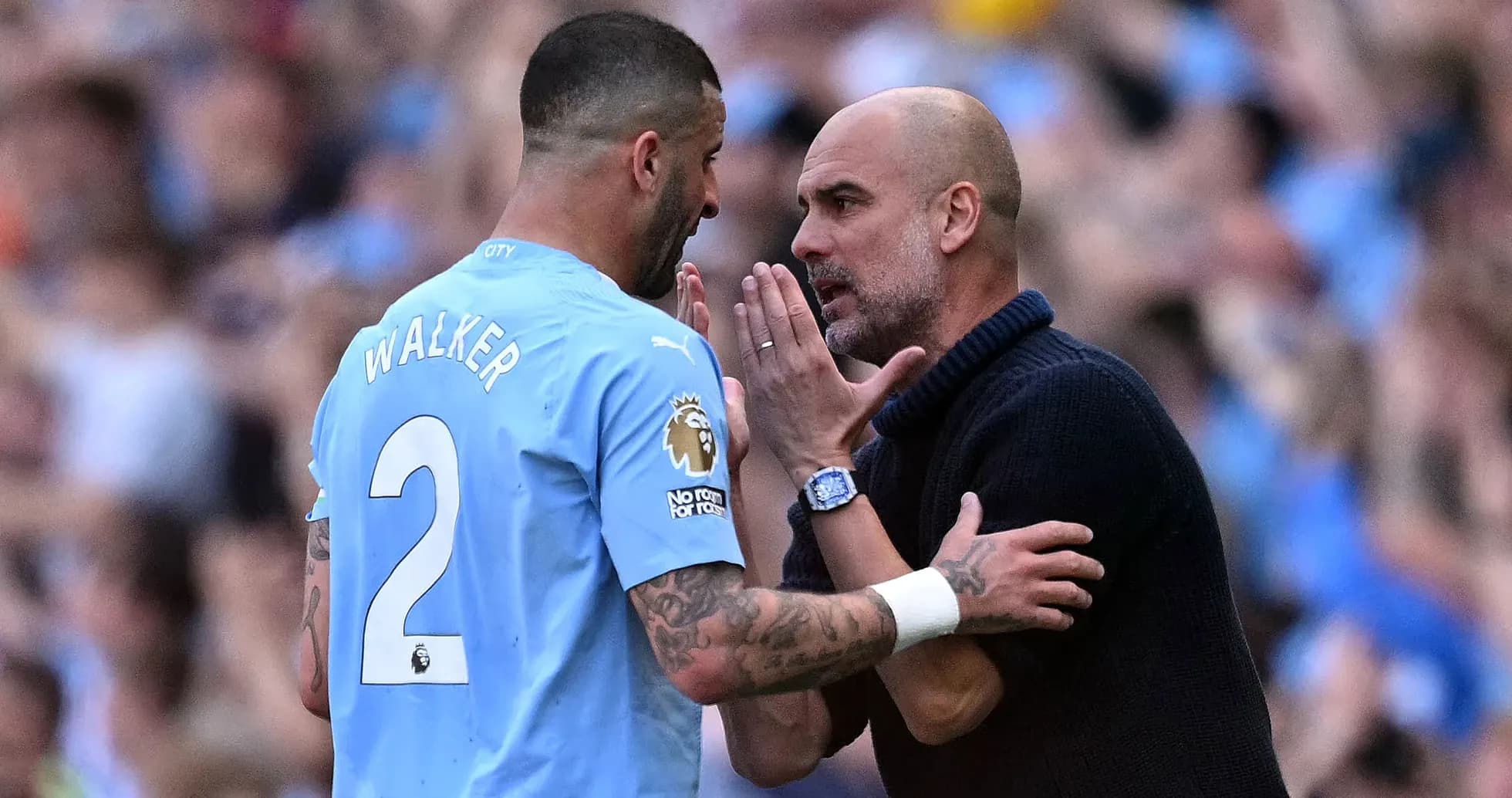 Kyle Walker and Pep Guardiola discussing during match