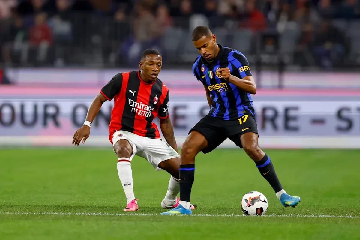 Two players competing for the ball in match