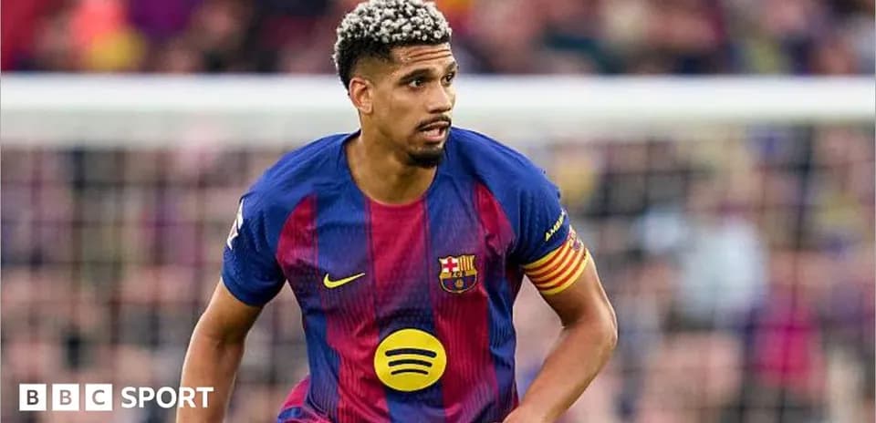 Player in Barcelona jersey running on the field