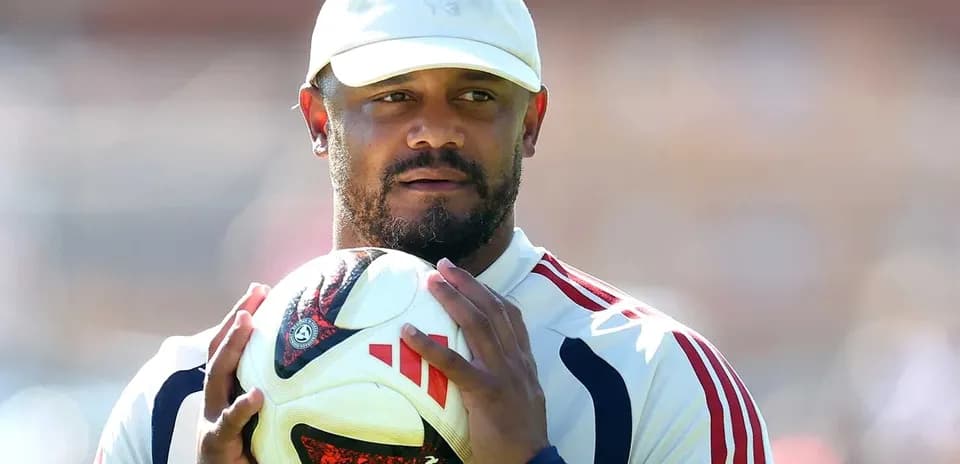 Man holding a soccer ball during training session
