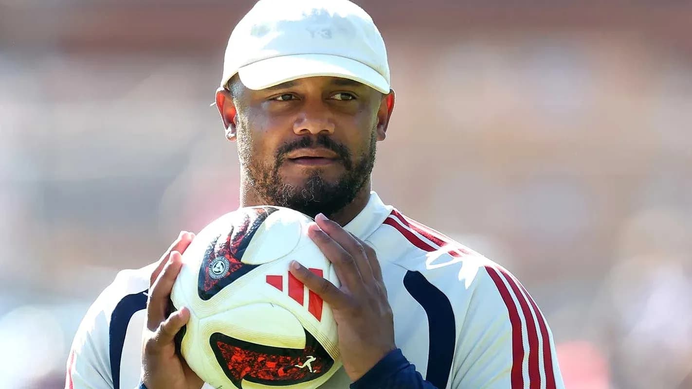 Man holding a soccer ball during training session