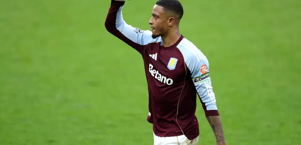 Aston Villa player celebrating during match