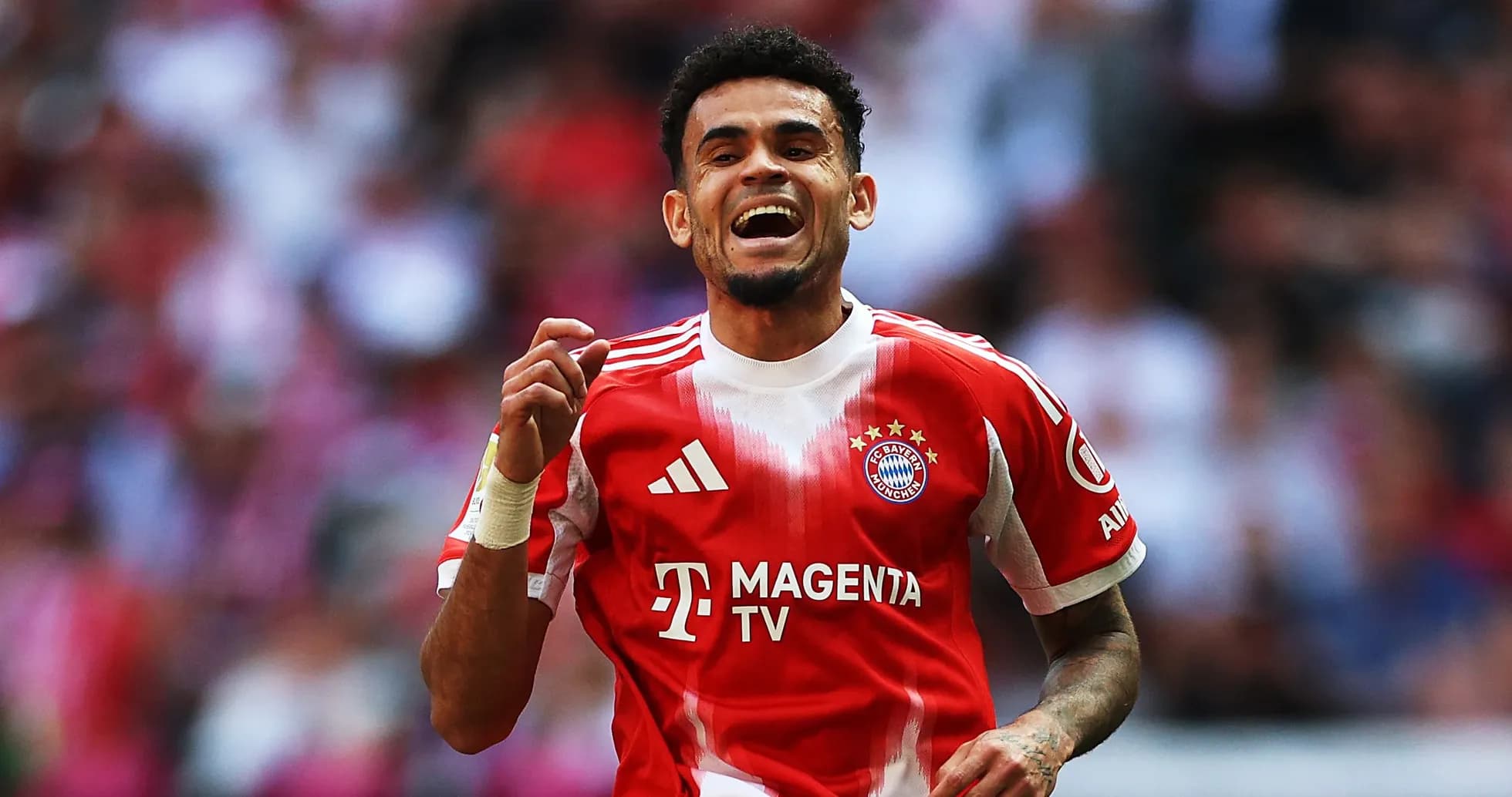 Player celebrating after scoring a goal for Bayern Munich