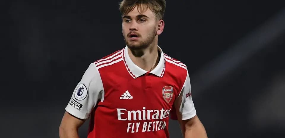 Player wearing Arsenal jersey during a match