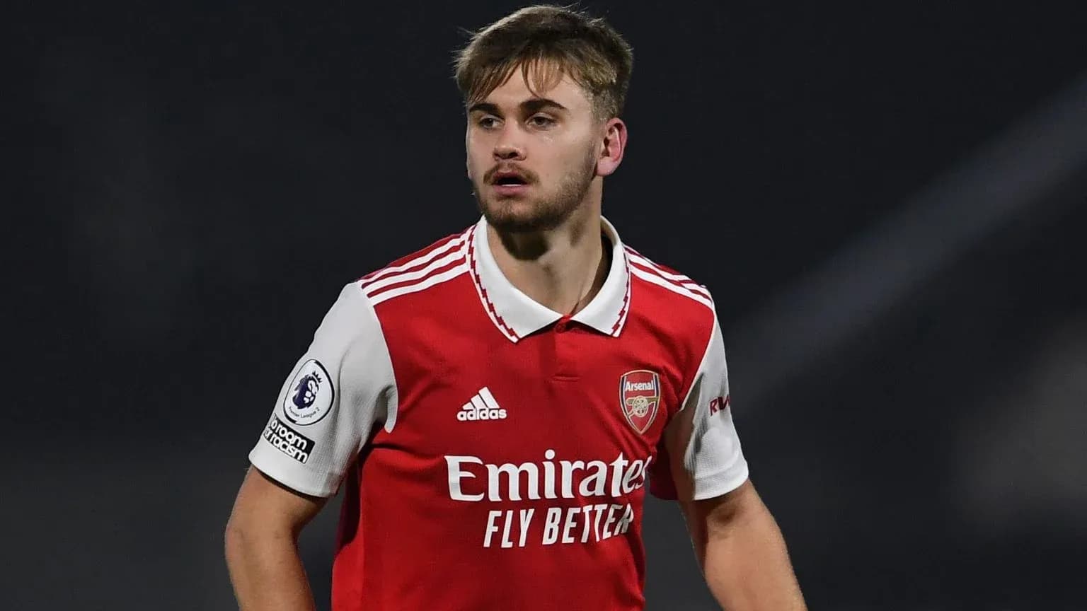 Player wearing Arsenal jersey during a match