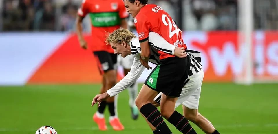 Players battling for the ball during a match