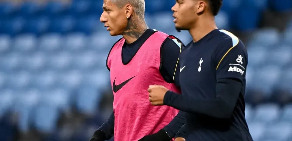 Two Tottenham players warming up before match