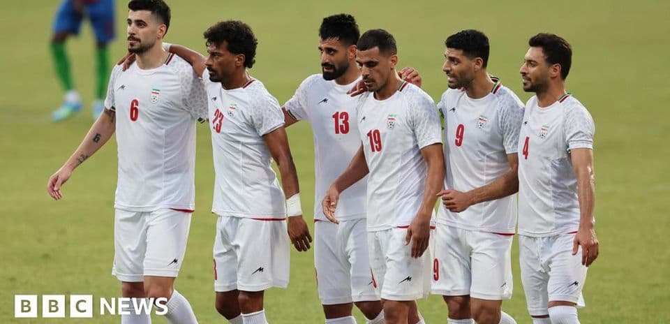 Iranian players celebrating during a football match