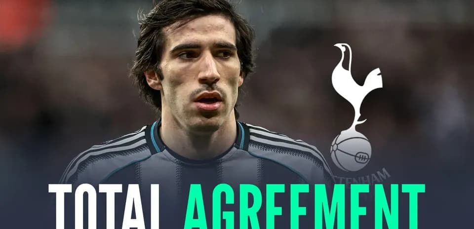 Player in jersey with Tottenham logo and text