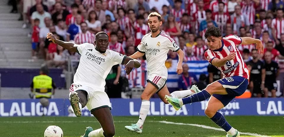 Atletico Madrid player shooting during La Liga match