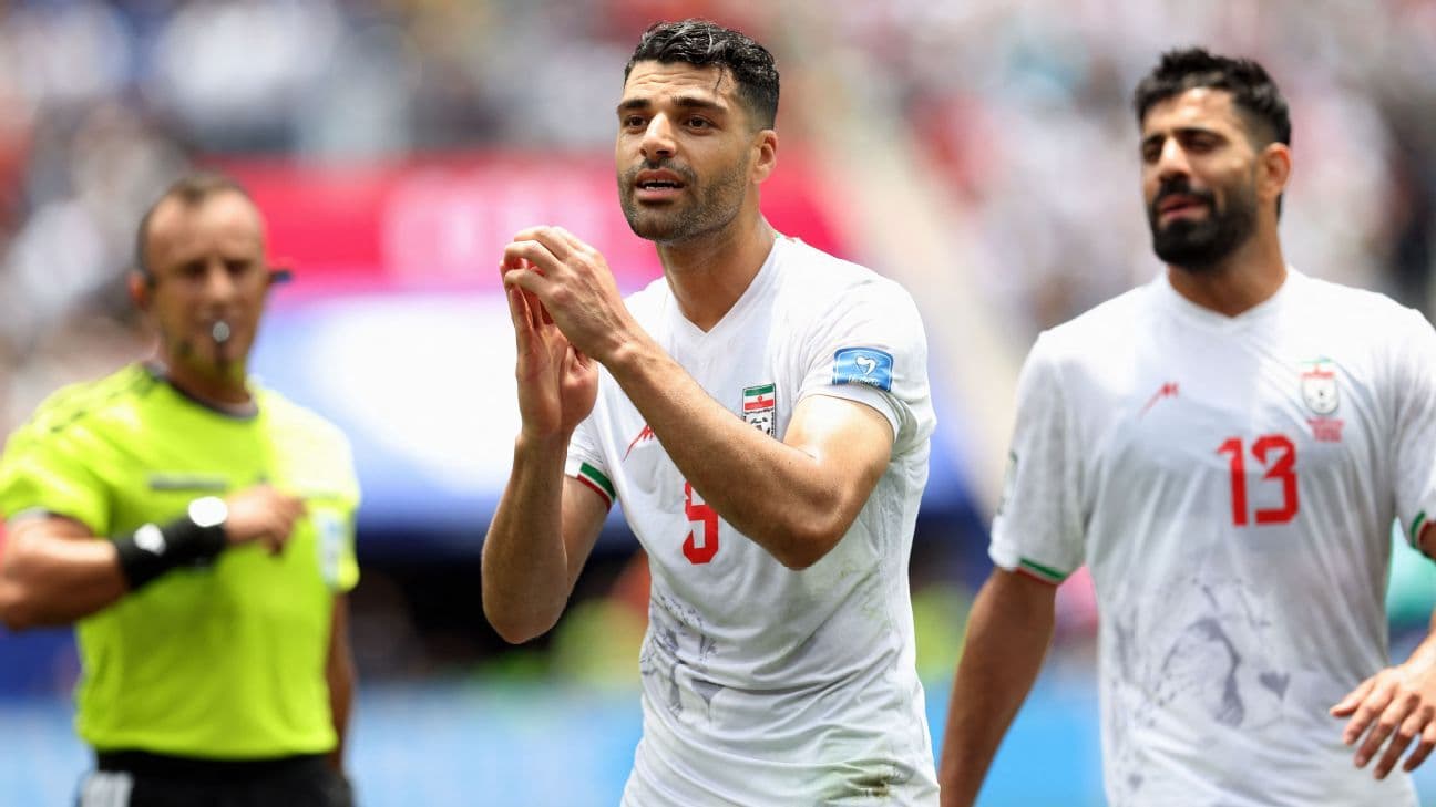 World Cup VAR Decisions: Iran's Disallowed Goal and Ngoy's Red Card Explained