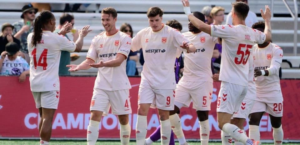 Cavalry FC players celebrating a goal Cavalry FC players celebrating a goal