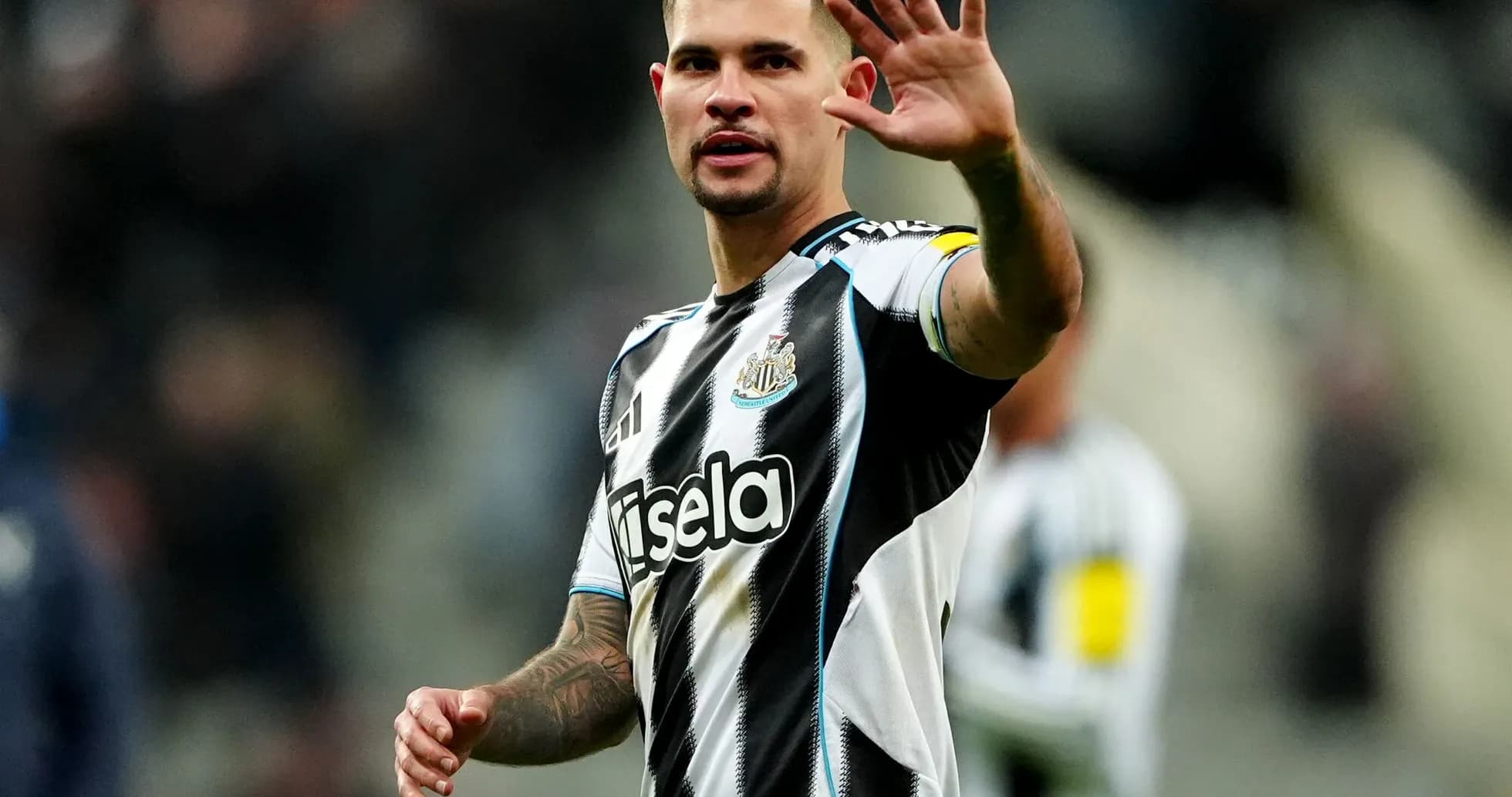 Player waving to fans during Newcastle match Player waving to fans during Newcastle match