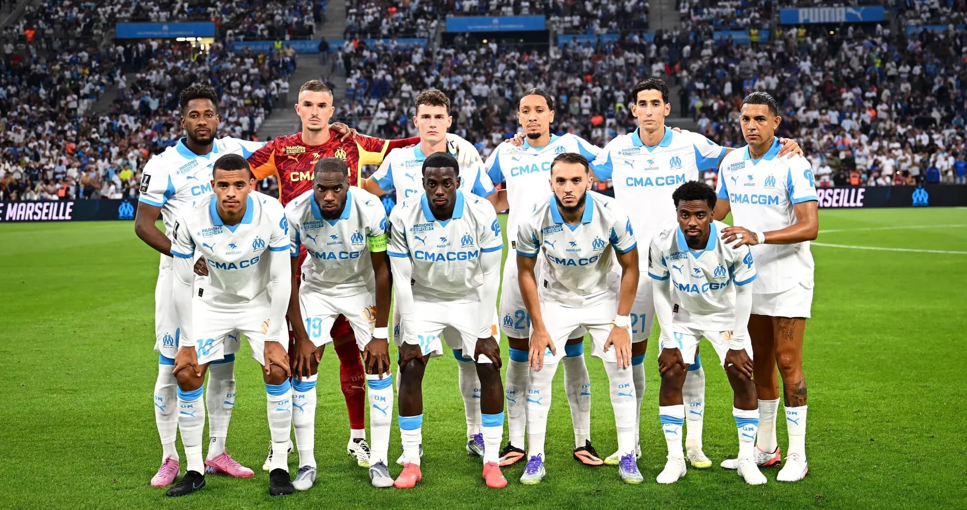 Olympique de Marseille team posing for group photo Olympique de Marseille team posing for group photo