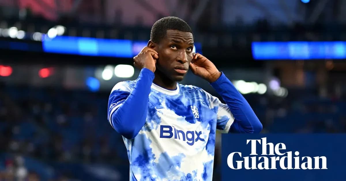 Player adjusting his earphones before match Player adjusting his earphones before match