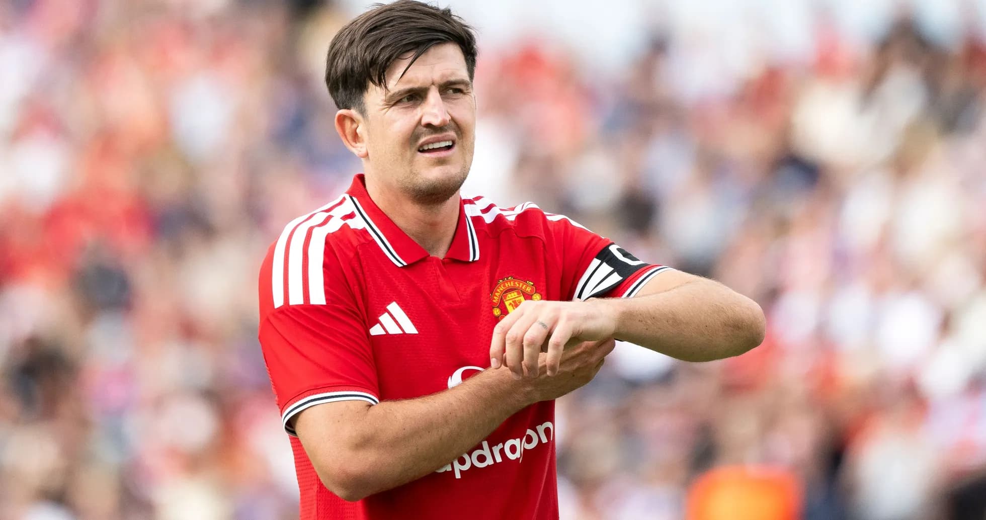 Player adjusting wrist during match for Manchester United Player adjusting wrist during match for Manchester United