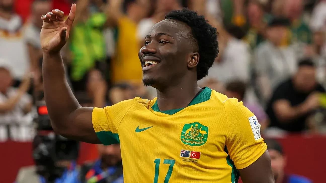 Player celebrating after scoring a goal for Australia Player celebrating after scoring a goal for Australia
