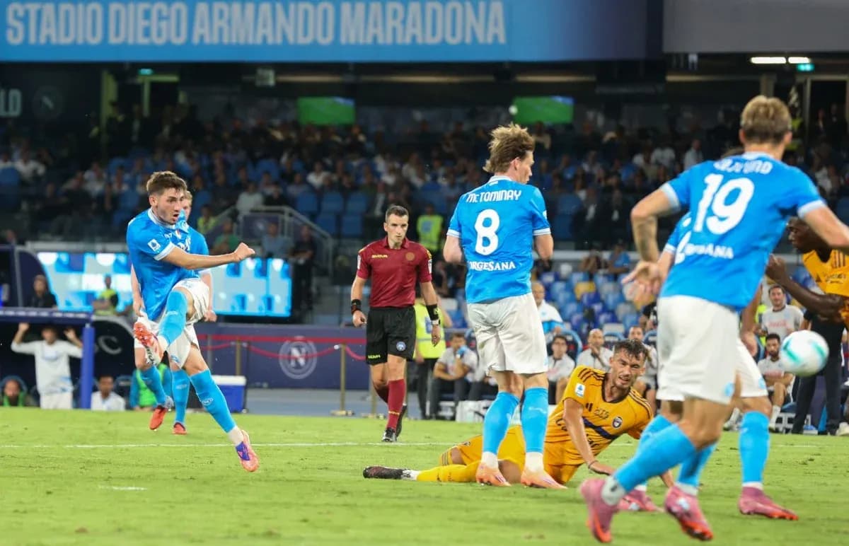 Napoli player striking the ball during match Napoli player striking the ball during match